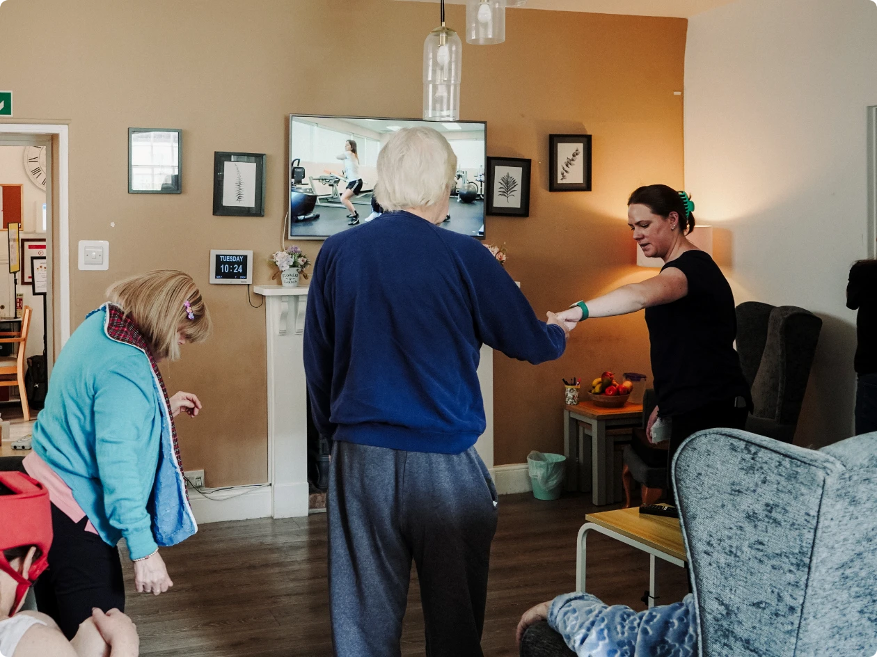 elderly people being helped